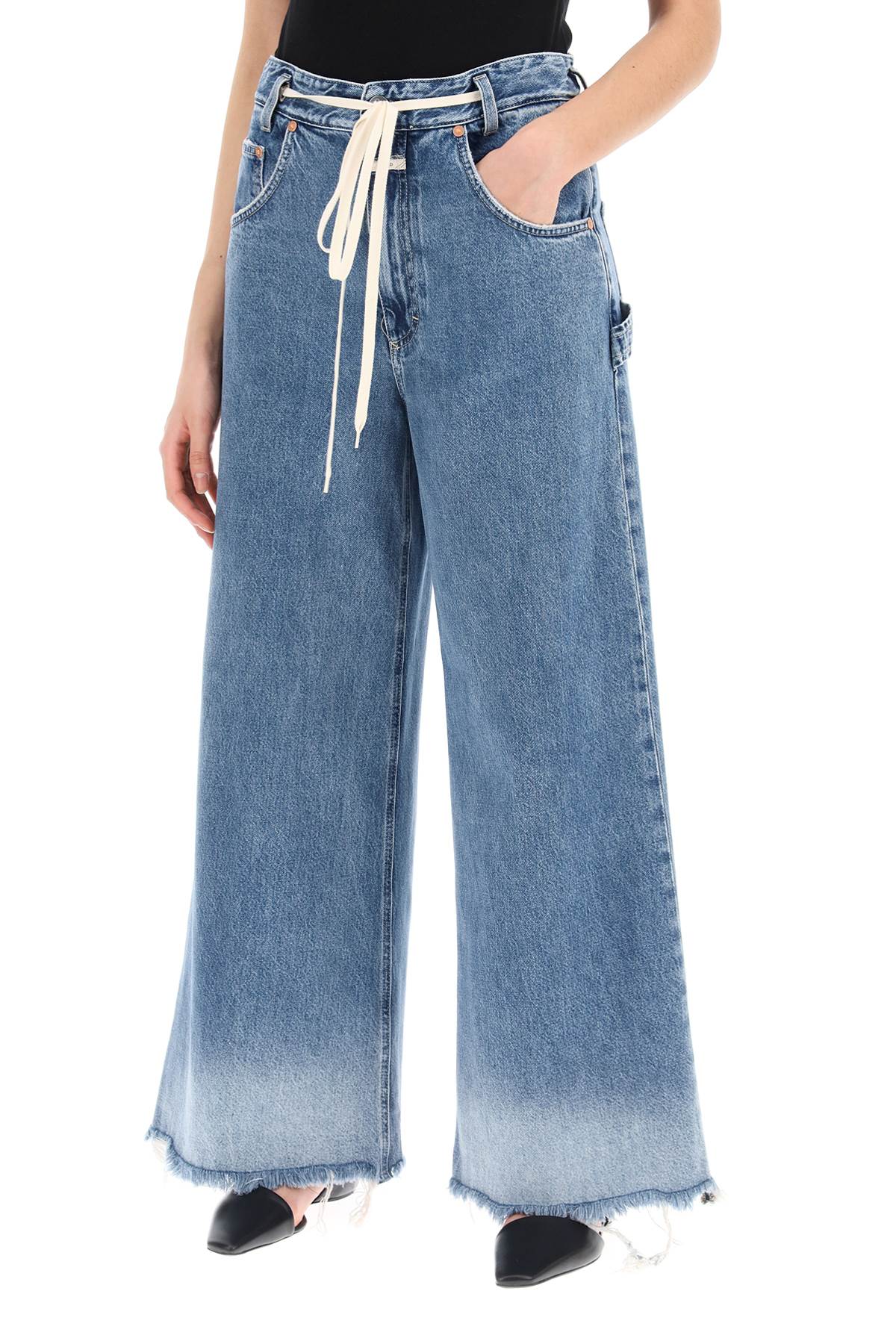 Closed wide leg jeans with distressed details.