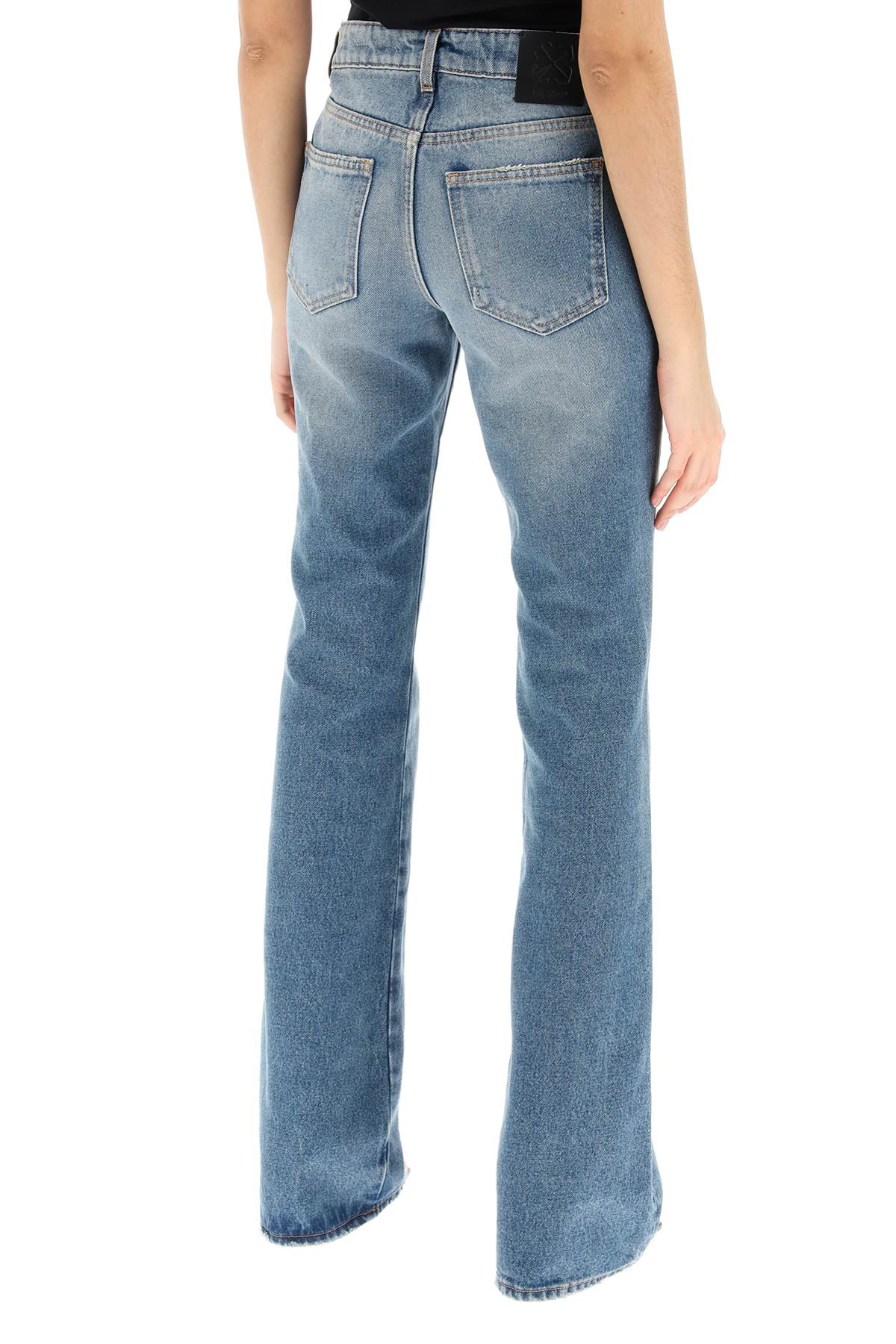 Off-white bootcut jeans