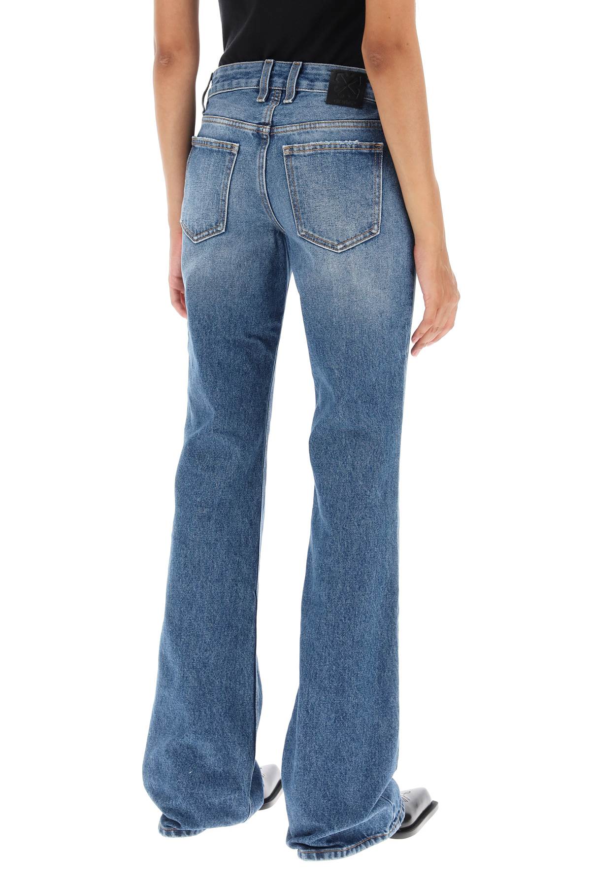 Off-white bootcut jeans